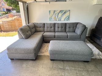 Gray 2 pc sectional couch with storage ottoman ( Delivery Available )