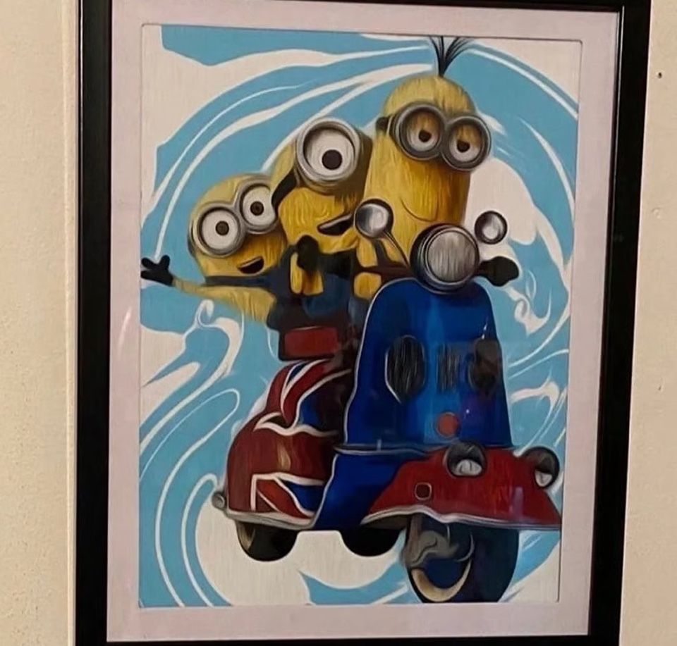 The minions custom art piece on black Frame