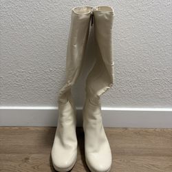 White knee high boots