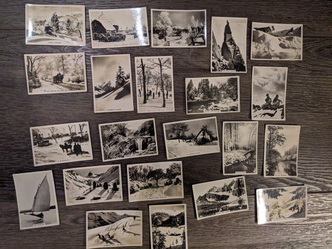 85 year old photo trading cards by Senior Service, a British brand of cigarettes. Includes 22 Cards of Winter Scenes in England, Switzerland, Norway, 
