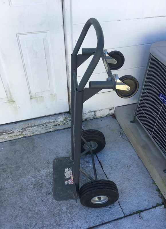 Dolly Hand Truck 4 wheels with stand up and lay down mode. Made by Milwaukee Truck Div. 600/600 pound load rating