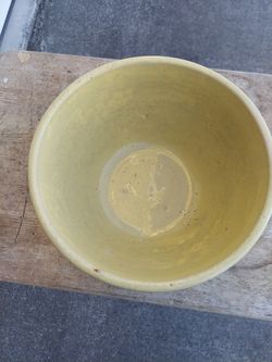 Antique yellow ceramic mixing bowl