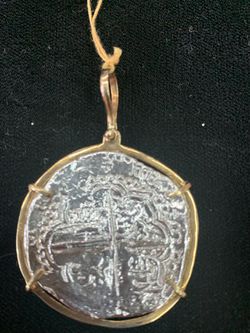 Atocha silver coin pendant in gold bezel