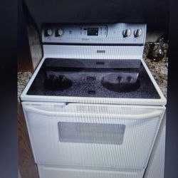 FOR SALE BOTH IN NEW CONDITION ELECTRIC STOVE AND WALL MICRO WAVE WHITE 