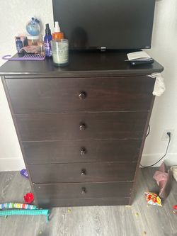 Dresser and Tv 24”