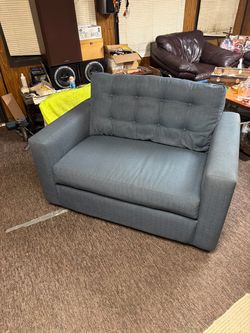 Blue-Gray Tufted Loveseat/hide a bed