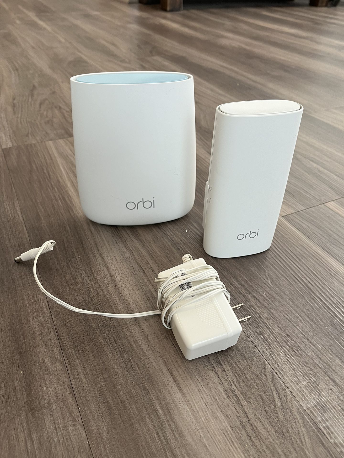 NETGEAR Orbi Compact Wall-Plug Whole Home Mesh WiFi System. Router and wall plug satellite extender.