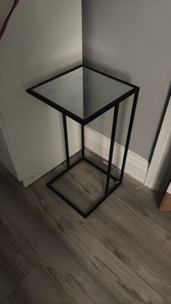 black glass stand