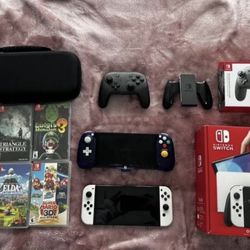 Switch OLED Model-WITH Games, Pro Controller And More- 64GB