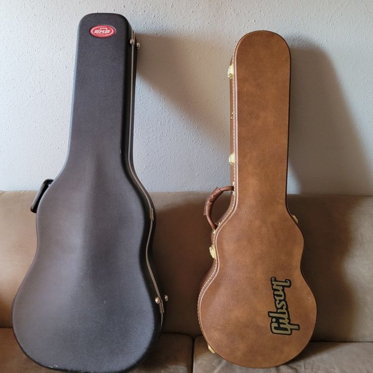 Three guitar cases for sale