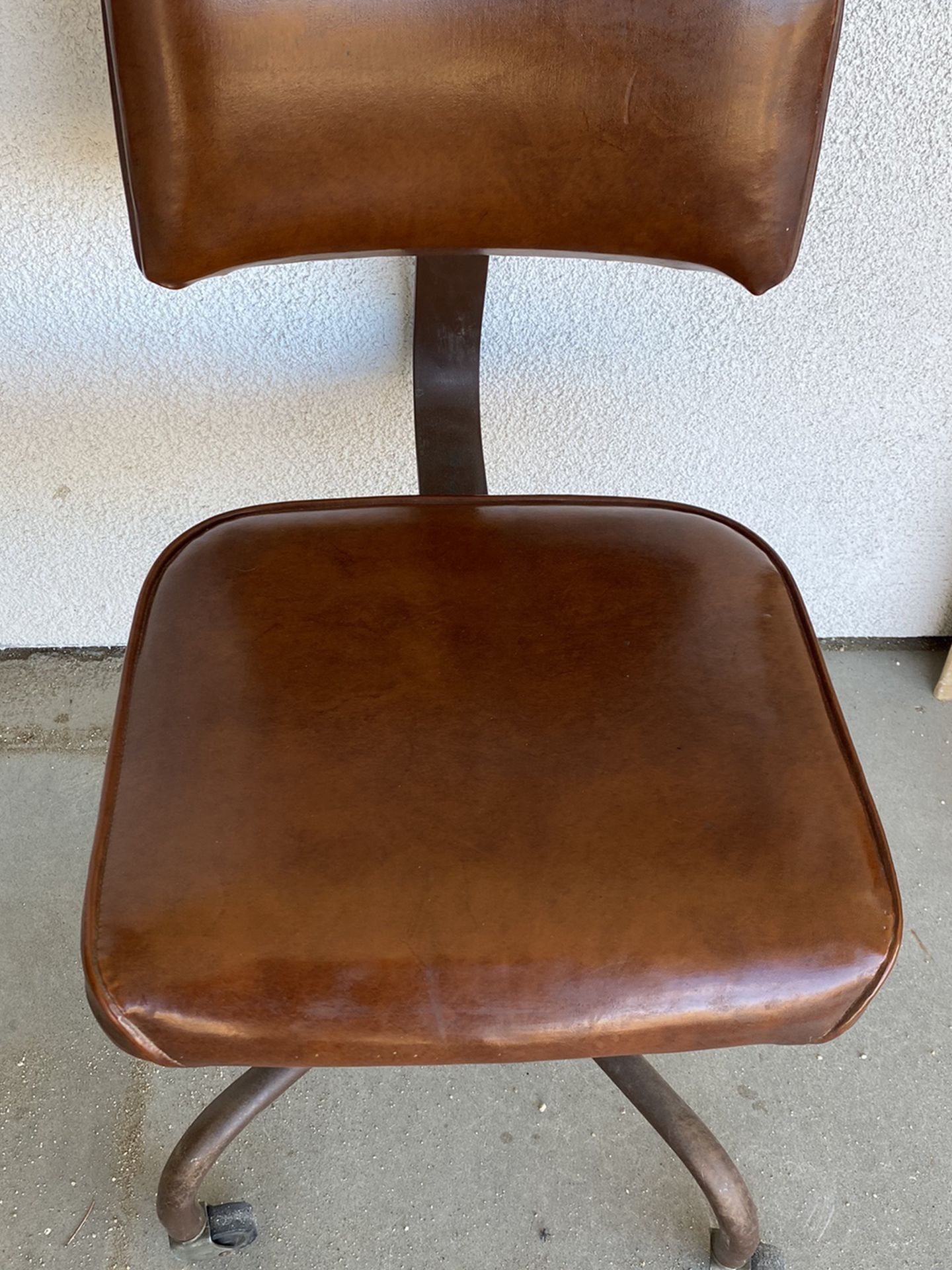 Vintage mid century rolling chair