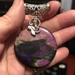 Statement Pendant of Polished Stone.