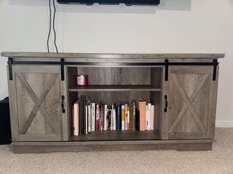 TV/entertainment stand with sliding doors