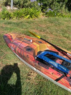 Kayak with oar, vest, outriggers