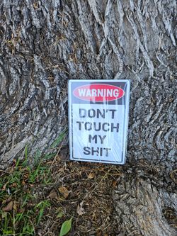 I don't touch my shit sign