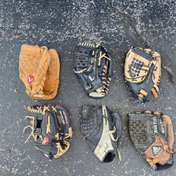 All Leather : Baseball Gloves  :   $25 each