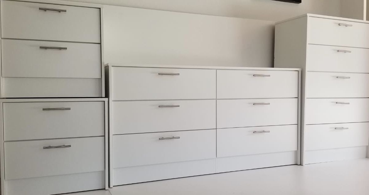 New white dresser chest and two nighstands