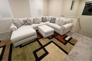 Large Light Gray Sectional Sofa with Ottoman