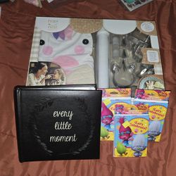 Set of 3 party invitations, 1 photo album, 1 be for bundles, little figure cookies. 