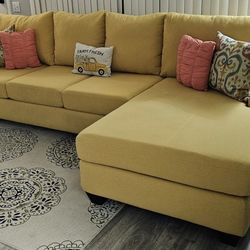 Like new! LIVING SPACES large yellow sectional sofa, 2 pieces, 124" x 68", excellent condition! All covers are removable for washing. I can deliver fo