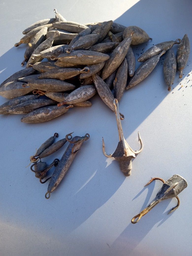 Lead Fishing Weights And A Few Hooks