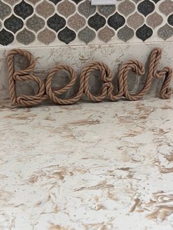 Beach rope sign