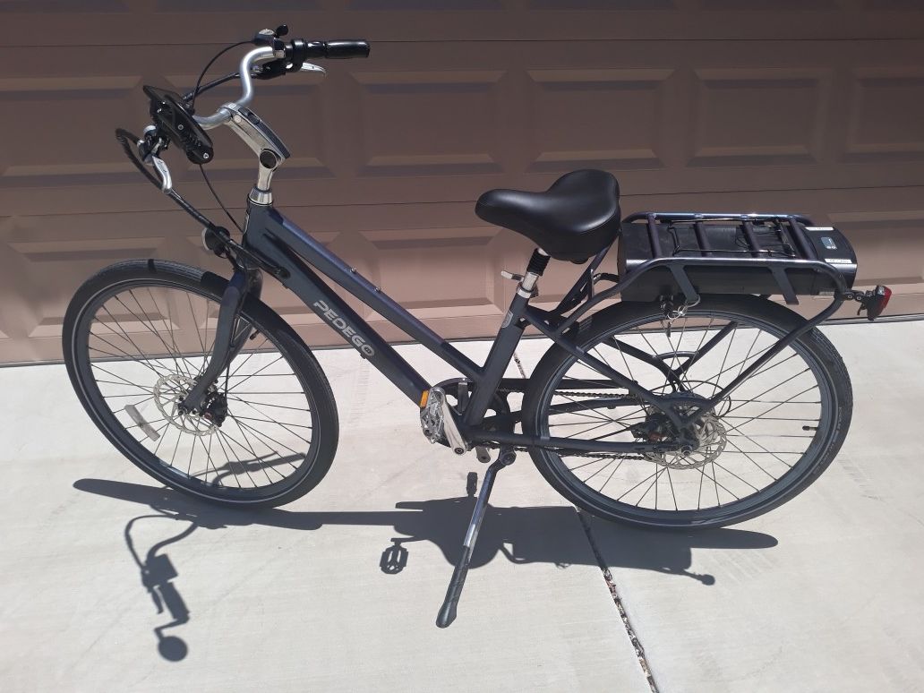 Pedego electric peddle assist City Commuter, 28" bicycle.