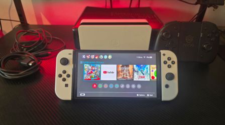 Nintendo Switch OLED with NYXI Controller and 128GB SD Card with Mario Odyssey