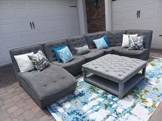 Gray 4 piece Modular Sectional and Ottoman