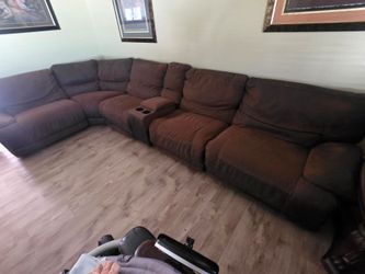 Brown sectional sofa with