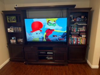 Entertainment center with 65 inch tv