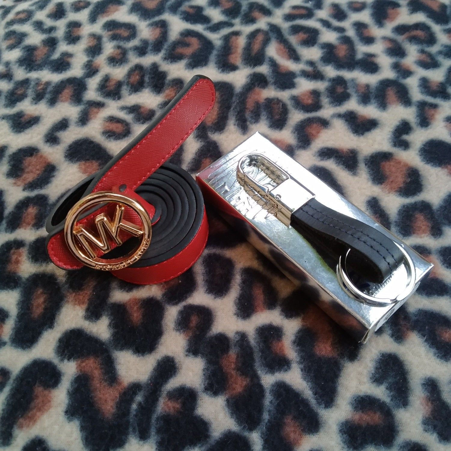 Women Mk belt and Rivera key ring.