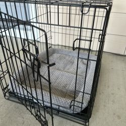 Dog Crate It’s 18in by 24in and 20 in deep
