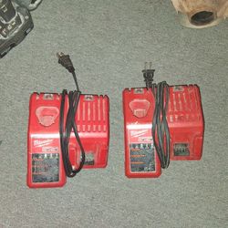 Two milwaukee chargers recharge both twelve and eighteen volt batteries