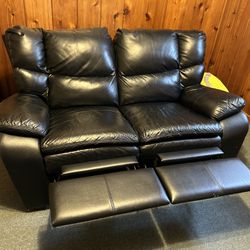 Leather love seat like new dual recliner!