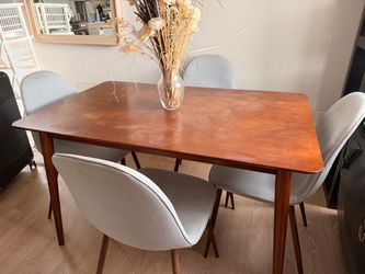 Wooden table with chairs