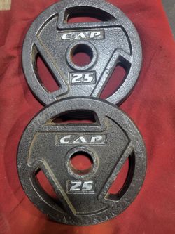CAPS  OLYMPIC PLATES  50LBs
2-25s  
11525 S HALSTED/7111.S WESTERN 
50$   CASH ONLY AS IS