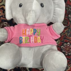 Linzy  toy gray elephant stuffed animal. Sings happy birthday. 10”