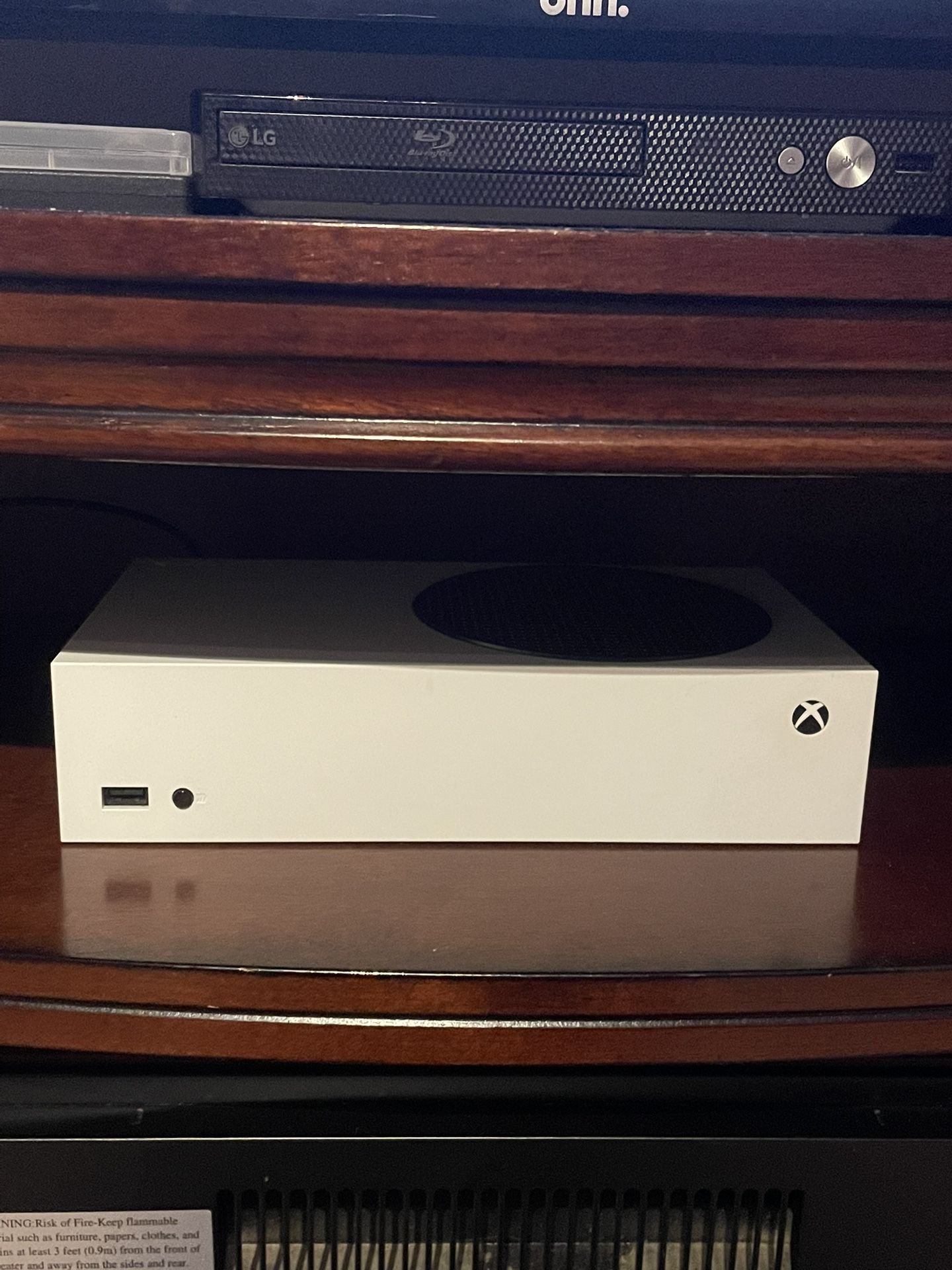 Xbox Series S and game chair,