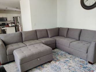 Thomasville sofa with storage ottoman ( negotiable)