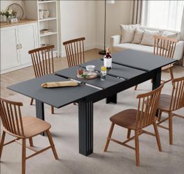 **Brand New extendable dining table (black)**