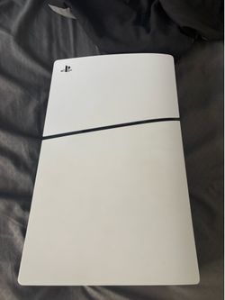 PS5 slim with two controllers and power cord PS5 slim with two controllers and power cord
