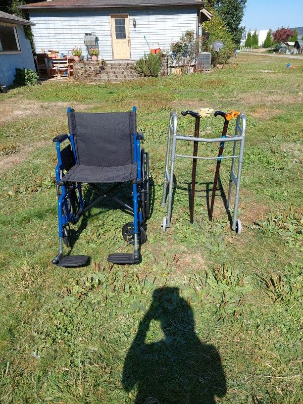 Wheel Chair, Walker, and 2 Canes