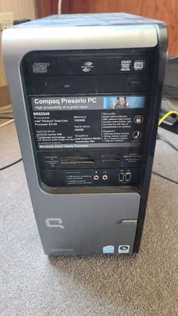 Compaq desktop and keyboard with HP monitor