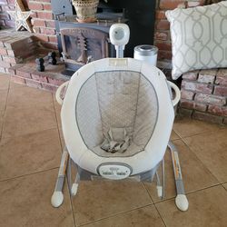 Graco electric baby swing.