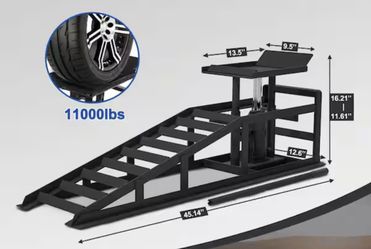 One pair of vehicle service ramps with jacks installed