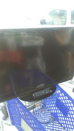 This is a 32 inch Dynex TV with remote