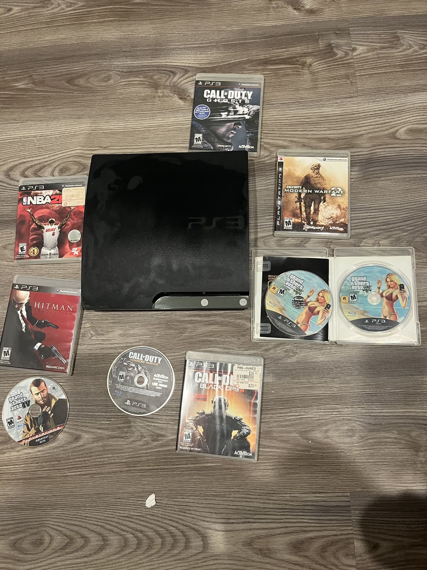 PS3 Slim 320GB console and (maybe) working games