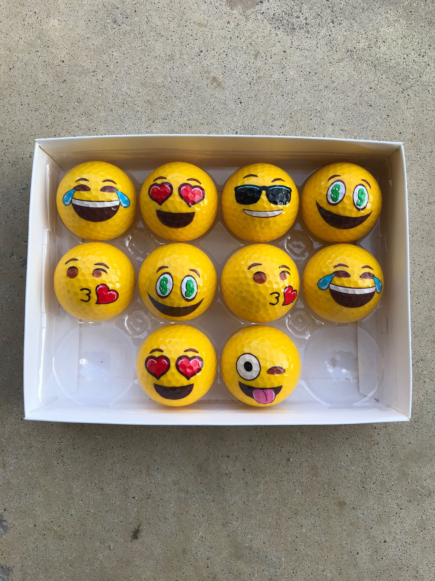 Emoji golf balls