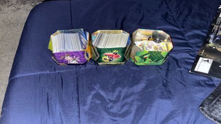 3 1/2 tins full of old Pokemon cards bulk